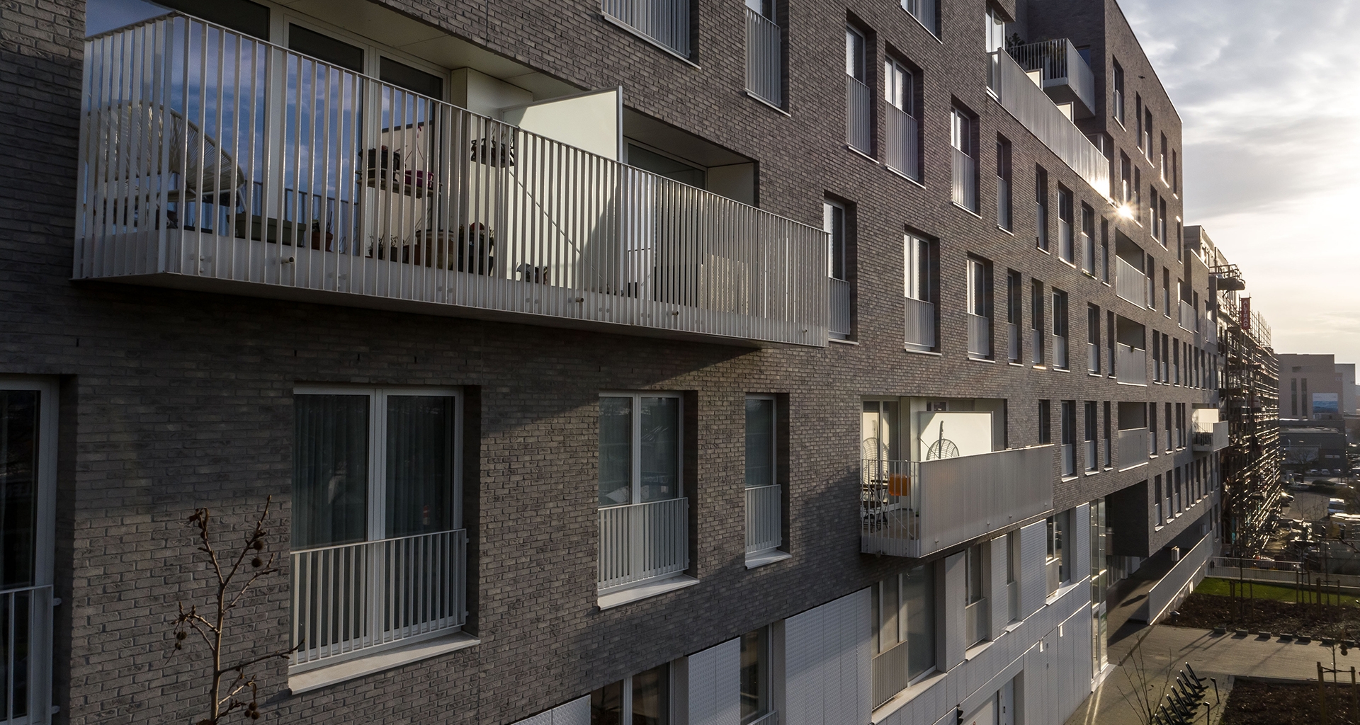 Briques des façades, panneaux fibres ciment et briquettes