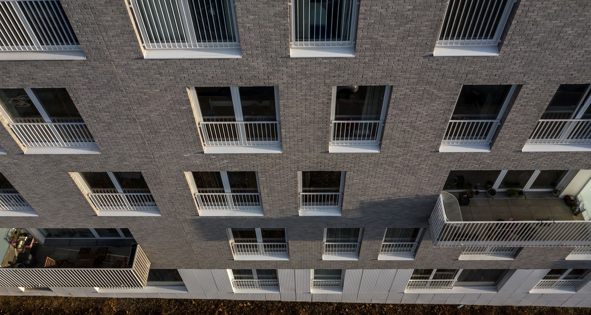 Briques des façades, panneaux fibres ciment et briquettes